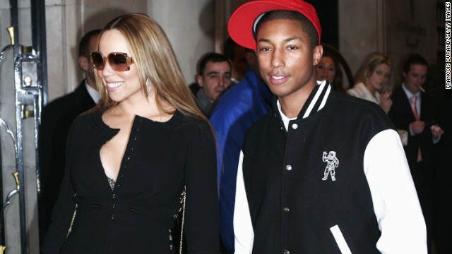 We'd have a glow, too, if we hung out with Mariah Carey, as Pharrell did in Paris in March 2006. The pair were shooting scenes for a music video to go with their single, "Say Somethin.'" 