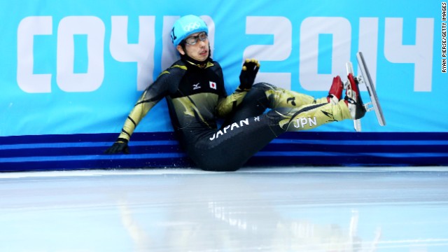 Short track speedskater Satoshi Sakashita of Japan hits the wall during the men's 500 meters on February 21.