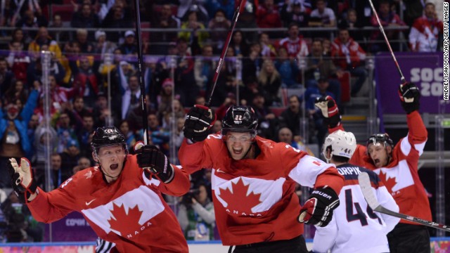 Canada's Jamie Benn, second from left, celebrates scoring the only goal in the men's hockey semifinal between Canada and the United States on Friday, February 21. 