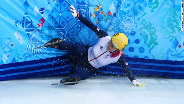 Elise Christie of Great Britain hits the wall while competing in a 1,000-meter short track semifinal.