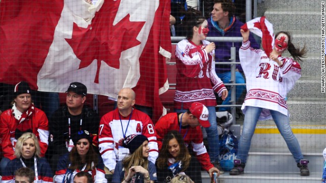 Fans celebrate Canada's 1-0 defeat of the United States.