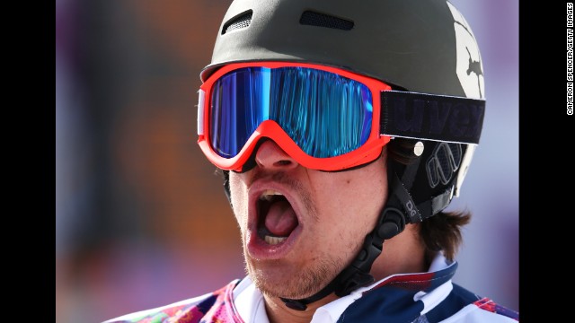 Wild celebrates after winning the men's snowboard parallel slalom 1/8 finals.