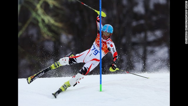 Emre Simsek of Turkey wipes out during the first run during the men's slalom on February 22. 