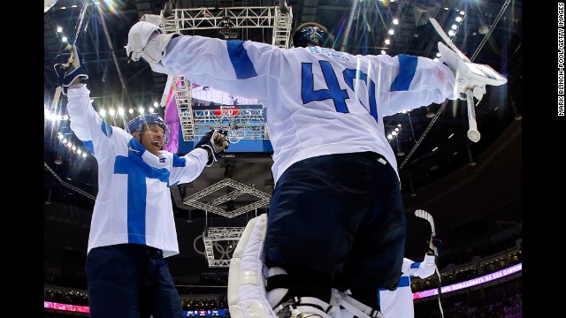 Finland's Tuukka Rask and Kimmo Timonen celebrate after defeating the United States to take the bronze in men's ice hockey on February 22. 