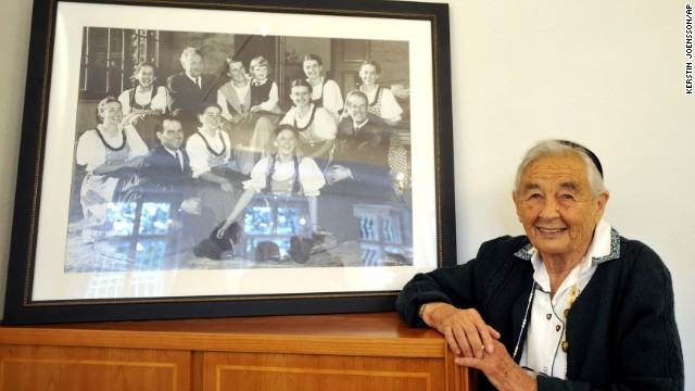 Maria von Trapp, seen here posing with a photo of her family, was the last of the singing siblings immortalized in the movie "The Sound of Music." She died February 18 of natural causes at her Vermont home, according to her family. She was 99.