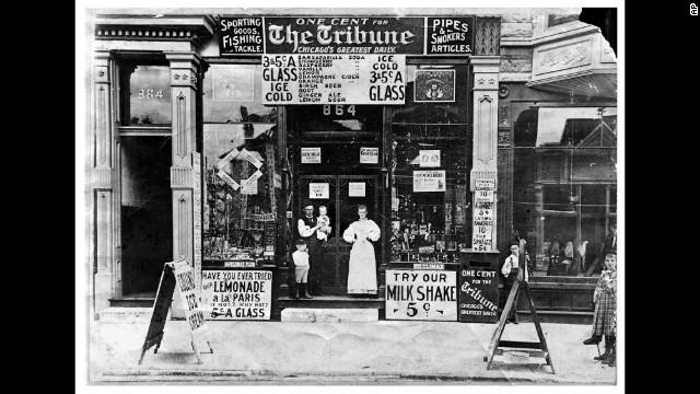 A soda parlor is seen on Chicago's South Western Avenue in 1895. The Chicago Tribune newspaper, shown here being sold for 1 cent, is still in publication today.