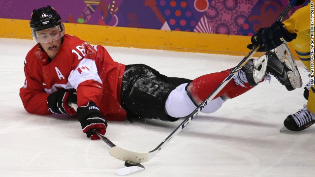 Canada forward Jonathan Toews fights for the puck in the second period of the gold medal men's hockey game against Sweden on Sunday, February 23. As world-class athletes compete in the Winter Olympics, we expect to see elegant and thrilling performances. But some finishes, in triumph, defeat or just plain exhaustion, often involve landing hard on a cold, wet surface. Here, we take a lighter look at those giving their all for a chance at the gold. | More photos: Visions of Sochi