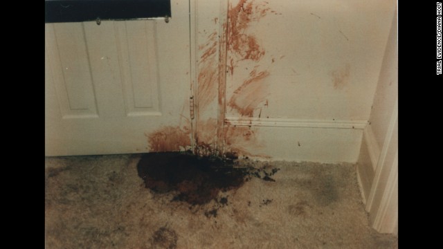 Holloway said he found her bloodied and battered body stuffed in this bedroom closet. Prosecutors said Elmore forced his way into the house through the back door to commit a robbery. An attack occurred in the kitchen, where Edwards suffered a blow so powerful that a denture plate flew out of her mouth, according to testimony.