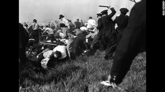 Armed with guns, clubs and tear gas, Chicago police put down a crowd of striking workers outside Chicago's Republic Steel plant on May 30, 1937. They killed 10 unarmed demonstrators and injured dozens in what was later called the Memorial Day Massacre. News cameras captured the brutality.