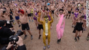 Scantily-clad participants warm up for the annual Beijing 