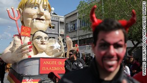 Poking fun: Angela Merkel got her own float last year.