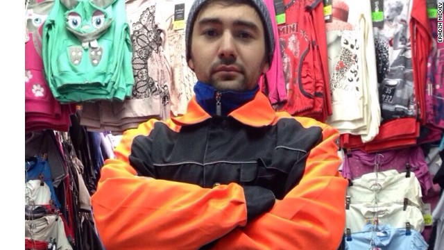 Eradzh Nidoev dressed for duty as a market worker