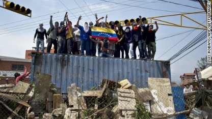 http://i2.cdn.turner.com/cnn/dam/assets/140224180526-venezuela-protests-24-feb-2-c1-main.jpg