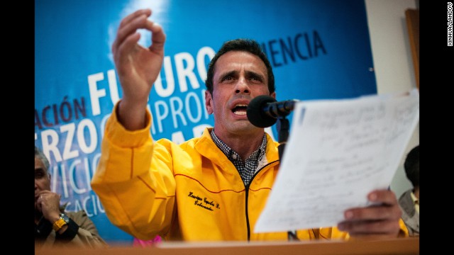 Henrique Capriles, an opposition leader and governor of the Venezuelan state of Miranda, joins in a news conference February 24 in Caracas. Opposition leaders and government officials blame each other for the unrest, and both sides show no sign of backing down. 