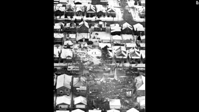 United Airlines Flight 553 plowed through a row of bungalows and burst into flames about a mile and a half south of Chicago's Midway Airport on December 8, 1972. The crash killed 45 people, two of them on the ground. Eighteen passengers survived. Investigators later ruled that pilot error caused the crash. 