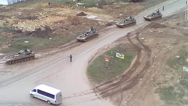 An image provided to CNN by a local resident shows Russian tanks on the move in Sevastopol.