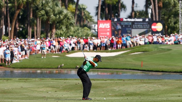 Tiger Woods has never won the Honda Classic and he has ground to make up if he's to triumph Sunday. 