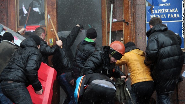 Pro-Russian activists clash with Maidan supporters as they storm the regional government building in Kharkiv, Ukraine, on March 1.