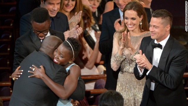 Lupita Nyong'o hugs McQueen after winning best supporting actress for her role in "12 Years a Slave."