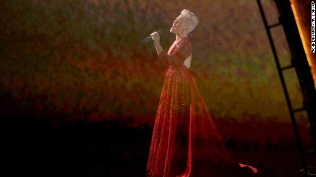 Pink sings "Over the Rainbow" while scenes from "The Wizard of Oz" are projected in the background. The performance was a tribute to the film's 75th anniversary.