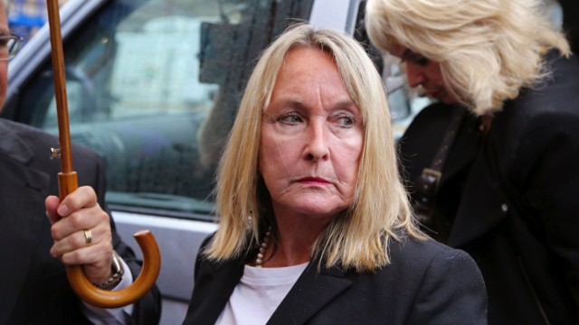 June Steenkamp arrives at the court building for the start of the trial.