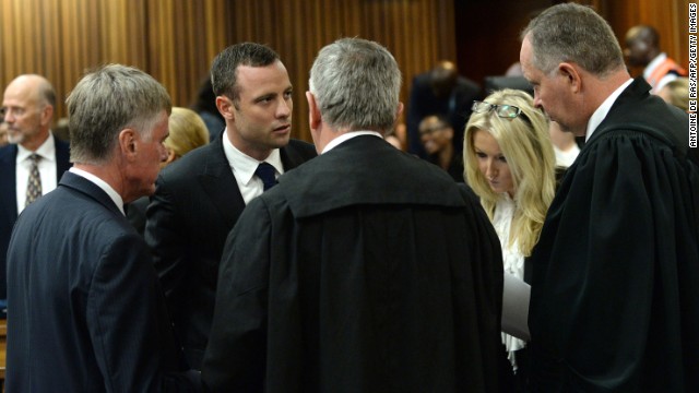 Pistorius speaks with his legal representatives on March 4.