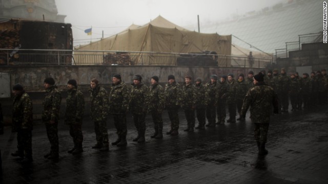 Ukrainian military recruits line up to receive instructions in Kiev's Independence Square on Tuesday, March 4. 