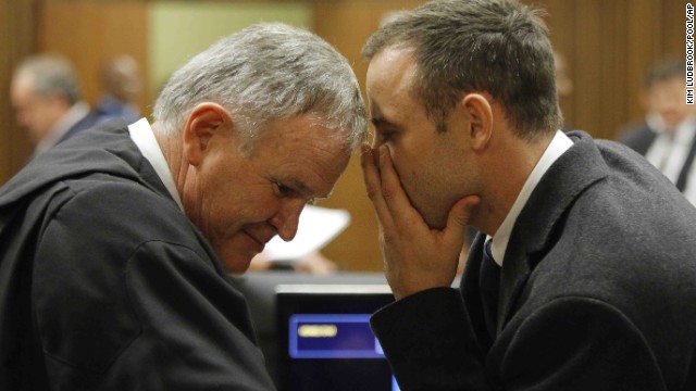 Pistorius talks with his attorney, Barry Roux, inside the court on March 4.