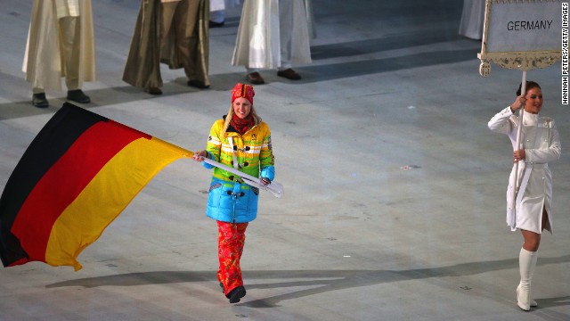 Skier Andrea Rothfuss carries the flag for Germany.