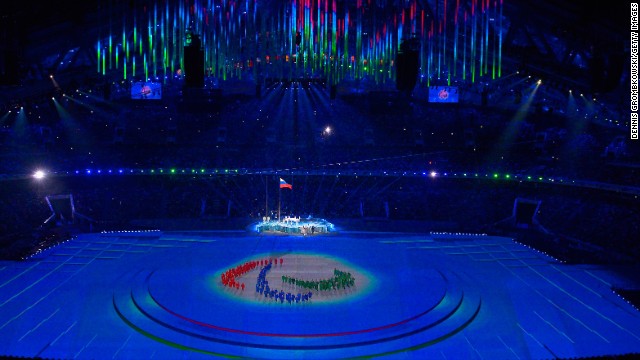 The Paralympic flag is raised during the ceremony.