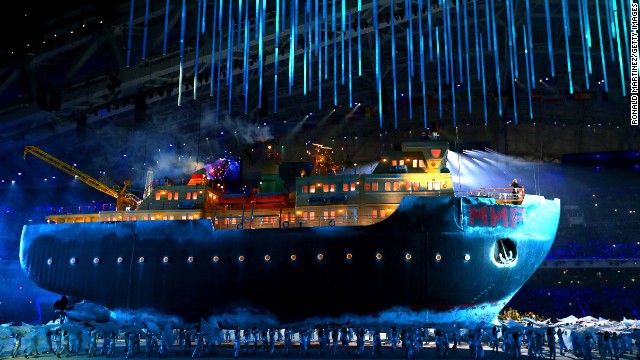 A model of a giant icebreaker enters the arena carrying opera singer Maria Guleghina.