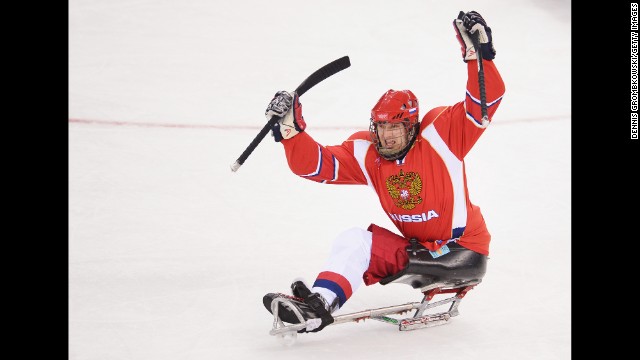 Vasilii Varlakov of Russia celebrates after scoring the first goal during the ice sledge hockey match between Russia and Korea on March 8. 