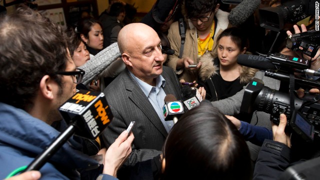 Hugh Dunleavy, commercial director of Malaysia Airlines, speaks to journalists March 9 at a Beijing hotel where relatives and friends of the missing flight's passengers are staying.