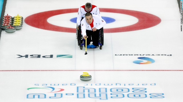 Bob McPherson of Great Britain competes in a mixed curling match versus Sweden on March 9. 