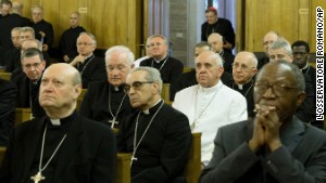 Pope Francis sits among bishops and cardinals at their recent annual retreat, as one of many.