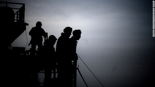 Soldiers are seen aboard the Ukrainian ship Slavutych in the harbor of Sevastopol on Tuesday, March 11.