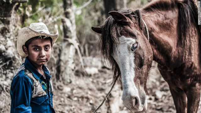 Many of former jockey Richard Dunwoody's pictures have an equine theme, including this of a boy and his blind pony in the countryside near Chimaltenango in Guatemala.