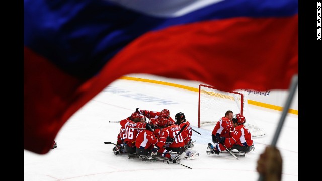 Russia's men's hockey team celebrates after winning a semifinal match against Norway on Thursday, March 13.