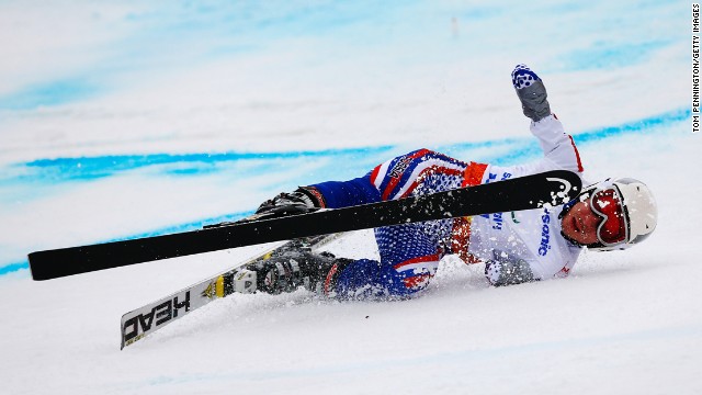 Aleksandr Akhmadulin of Russia crashes in the men's giant slalom standing on March 15.