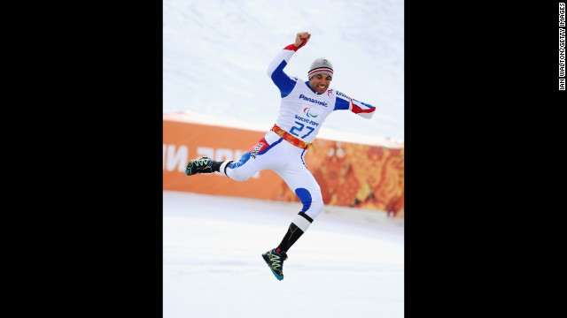 Vincent Gauthier-Manuel of France celebrates winning the gold medal in the giant slalom standing during day eight of the Sochi 2014 Paralympic Winter Games.