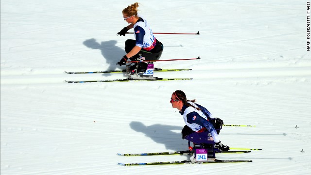 Beth Requist and Tatyana McFadden of the United States compete in the women's cross-country 5-kilometer sitting event.