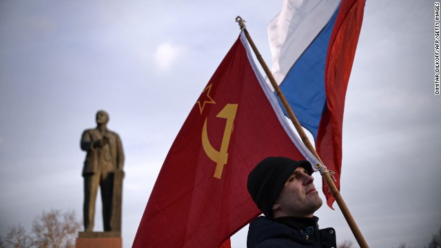 A Crimean man holds a Soviet Union flag in Lenin Square in Simferopol, Ukraine, on March 16.