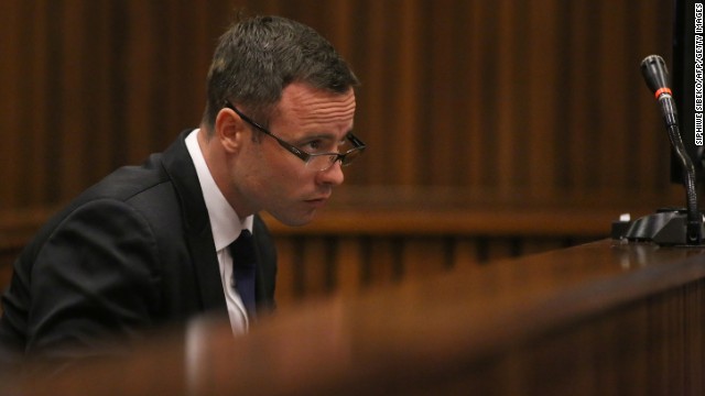 Pistorius takes notes Monday, March 17, as his murder trial enters its third week.