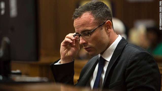 Oscar Pistorius, sits in the dock on March 17, 2014. during his trial for the murder of his girlfriend Reeva Steenkamp.