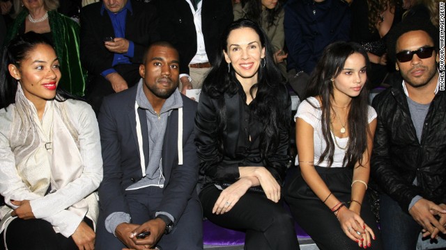 Scott attends the Yves Saint Laurent Fashion Show in Paris with musicians Kanye West, second from left, and Lenny Kravitz, far right, in October 2006.