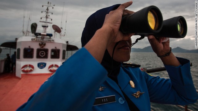 A member of Indonesia's National Search and Rescue Agency joins in a search for the missing plane in the Andaman <!-- -->
</br>Sea area around the northern tip of Indonesia's Sumatra on Monday, March 17.