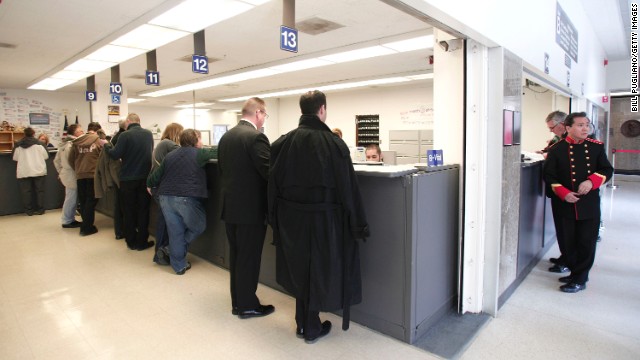 Same-sex couples get their marriage licenses at the Oakland County Courthouse in Pontiac, Michigan, on Saturday, March 22, a day after a federal judge overturned Michigan's ban on same-sex marriage.