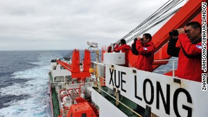 Crew members on search duty on board the Chinese icebreaker Xuelong on March 23, 2014.