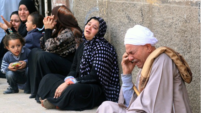 Relatives outside the courthouse in the southern province of Minya react to news of the sentence on March 24. 