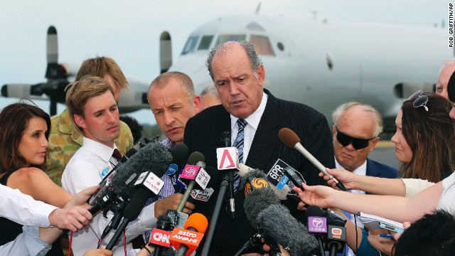 Australian Defense Minister David Johnston speaks to the media March 25 about the search for the missing jet.